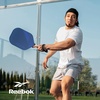 image:imageReebok  Pickleball Set for 2 Players Includes 2 Paddles with Cushion Grip and 2 LightUp Balls Perfect for Night Play Durable Engineered for Sports EnthusiastsBlueWhite