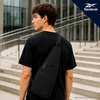image:imageReebok Unisex Convertible Crossbody Sling Bag for Women amp Men Compact  Adjustable Strap for Vesatile Carry Organized Pockets for Phone Keys amp Wallet Durable Hardware Everyday Daily Carry or GyMaeve Black