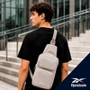 image:imageReebok Unisex Convertible Crossbody Sling Bag for Women amp Men Compact  Adjustable Strap for Vesatile Carry Organized Pockets for Phone Keys amp Wallet Durable Hardware Everyday Daily Carry or GyMikayla Stucco