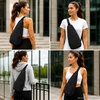 image:imageReebok Unisex Convertible Crossbody Sling Bag for Women amp Men Compact  Adjustable Strap for Vesatile Carry Organized Pockets for Phone Keys amp Wallet Durable Hardware Everyday Daily Carry or GyMaeve Black