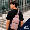 image:imageReebok Unisex Convertible Crossbody Sling Bag for Women amp Men Compact  Adjustable Strap for Vesatile Carry Organized Pockets for Phone Keys amp Wallet Durable Hardware Everyday Daily Carry or GyMikayla Ashen Lilac