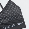 image:imageReebok Womens Sports Bras  2 Pack Padded Longline Crossback Straps  Seamless Stretch Fabric Moves with You Removable Pads Customize Coverage Comfortable Support for Everyday WearBlackened Pearl JacquardMauve Mist