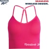 image:imageReebok Womens Sports Bras  4 Pack WireFree Longline Bralettes  Seamless Build Hugs Without Squeezing Adjustable Crossback Straps Adapt to Your Workout or Everyday RoutineSpacedyePink