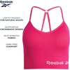 image:imageReebok Womens Sports Bras  4 Pack WireFree Longline Bralettes  Seamless Build Hugs Without Squeezing Adjustable Crossback Straps Adapt to Your Workout or Everyday RoutineSpacedyePink