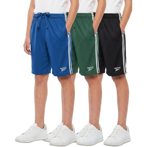 image:imageReebok 3 Pack Boys Dry Fit Athletic Shorts wSide Taping  Active Quick Dry Running Basketball Soccer Short for Kids TeensSolid Black  Solid Hunter Green  Solid Blue Iolite