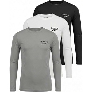 image:imageReebok 3 Pack Boys Long Sleeve Rashguard UPF Sun Protection Swim Shirt UV SPF Athletic Beach Pool Surfing Swimming 616Solid Black  Solid Bright White  Solid Ultimate Grey