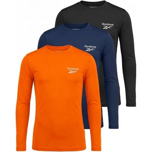 image:imageReebok 3 Pack Boys Long Sleeve Rashguard UPF Sun Protection Swim Shirt UV SPF Athletic Beach Pool Surfing Swimming 616Solid Black  Solid Navy Blazer  Solid Tangerine