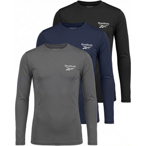 image:imageReebok 3 Pack Boys Long Sleeve Rashguard UPF Sun Protection Swim Shirt UV SPF Athletic Beach Pool Surfing Swimming 616Solid Black  Solid Navy Blazer  Solid Quiet Shade