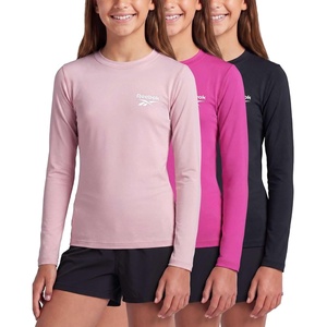image:imageReebok 3 Pack Girls Long Sleeve Rashguard Swim Shirt UPF Sun Protection Rasghguard Swimsuit for Kids Teens TweensSolid Black  Solid Fuchsia Fedora  Solid Fragrant Lilac