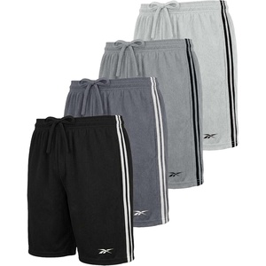 image:imageReebok 4 Pack Boys Athletic Mesh Shorts with Side Taping  Basketball Soccer Running Quick Dry Active Kids Teens YouthSolid Black  Solid Quiet Shade  Solid Ultimate Grey  Solid Dawn Blue