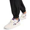 image:imageReebok Womens Bv Woven Pant Standard Fit 29 Inseam Lightweight Nylon Crinkle Woven FabricBlackGlitch Aqua