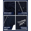 image:imageReebok Womens Polar Fleece Lined Windbreaker Jacket with Hood amp Waist  WaterResistant Shell with Cozy Soft Lining Wide Collar Blocks Wind Adjustable Fit for Everyday Fall WearNavy