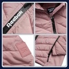 image:imageReebok Womens Puffer Jacket  Midweight Quilted Puffer Jacket with Hood  Sleek Silhouette Layers Over Jeans or Leggings WindResistant Shell for Commutes and Weekend HikesPink Haze