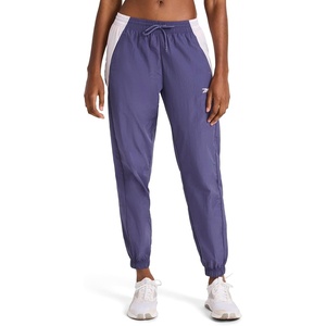 image:imageReebok Womens Bv Woven Pant Standard Fit 29 Inseam Lightweight Nylon Crinkle Woven FabricTwilight Purple