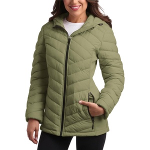 image:imageReebok Womens Puffer Jacket  Midweight Quilted Puffer Jacket with Hood  Sleek Silhouette Layers Over Jeans or Leggings WindResistant Shell for Commutes and Weekend HikesCypress Green