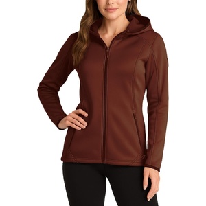 image:imageReebok Womens Softshell Jacket Water amp Windproof Fleece Lined Hooded Coat  Breathable Stretch Shell Moves with You Zippered Pockets Keep Keys Secure Versatile for Gym Running and Trail DaysCognac