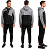 image:imageReebok Mens Lightweight FleeceLined Softshell Jacket Wind Resistant Hood  Wind and Water Resistant Shell for Daily Commutes or Travel Streamlined Athletic Cut Protective Collar for Chilly MorningsGrey