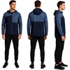 image:imageReebok Mens Lightweight FleeceLined Softshell Jacket Wind Resistant Hood  Wind and Water Resistant Shell for Daily Commutes or Travel Streamlined Athletic Cut Protective Collar for Chilly MorningsMineral Blue