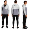image:imageReebok Mens Lightweight FleeceLined Softshell Jacket Wind Resistant Hood  Wind and Water Resistant Shell for Daily Commutes or Travel Streamlined Athletic Cut Protective Collar for Chilly MorningsPale Grey