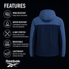 image:imageReebok Mens Lightweight FleeceLined Softshell Jacket Wind Resistant Hood  Wind and Water Resistant Shell for Daily Commutes or Travel Streamlined Athletic Cut Protective Collar for Chilly MorningsMineral Blue