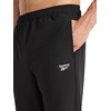 image:imageReebok Mens Repeat Woven Pant Standard Fit 30 Inseam Lightweight Stretch PolyBlend FabricBlack