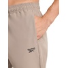 image:imageReebok Mens Repeat Woven Pant Standard Fit 30 Inseam Lightweight Stretch PolyBlend FabricDriftwood