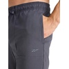 image:imageReebok Mens Striker Pant Standard Fit 30 Inseam Lightweight Poly FabricEbony