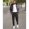image:imageReebok Mens Winter Jacket Heavyweight Insulated Quilted Hooded Puffer Coat  DownAlternative Fill Traps Heat Without Bulk Water Resistant and Windproof Shell for Commutes or Outdoor UseCharcoal