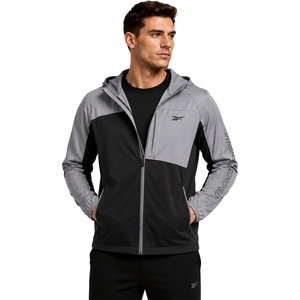 image:imageReebok Mens Lightweight FleeceLined Softshell Jacket Wind Resistant Hood  Wind and Water Resistant Shell for Daily Commutes or Travel Streamlined Athletic Cut Protective Collar for Chilly MorningsGrey