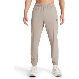 image:imageReebok Mens Repeat Pant Standard Fit 30 Inseam Lightweight Stretch Recycled Nylon FabricDriftwood