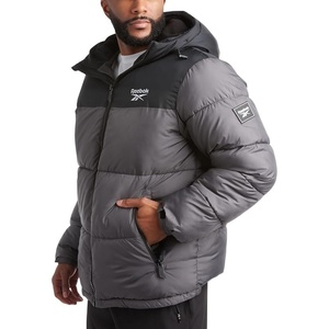 image:imageReebok Mens Winter Jacket  Heavyweight Insulated Puffer Jacket with Hood  Wind and Water Resistant Fabric Blocks Chill Sturdy FullZip Closure for Easy Layering Versatile Everyday StyleCharcoal Grey Ash