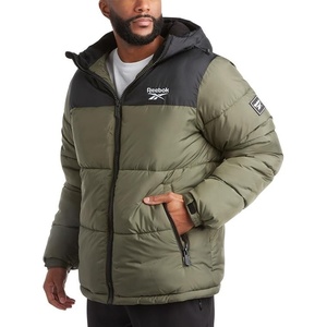 image:imageReebok Mens Winter Jacket  Heavyweight Insulated Puffer Jacket with Hood  Wind and Water Resistant Fabric Blocks Chill Sturdy FullZip Closure for Easy Layering Versatile Everyday StyleOlive