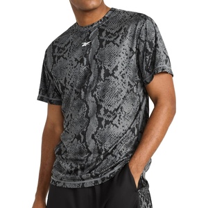 image:imageReebok Mens Small Logo Short Sleeve Crewneck TShirt Standard Fit Breathable Lightweight Stretch Knit FabricBlack  Id Train Snake
