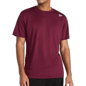 image:imageReebok Mens Small Logo Short Sleeve Crewneck TShirt Standard Fit Breathable Lightweight Stretch Knit FabricBlack Cherry Heather  Sprint