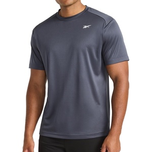 image:imageReebok Mens Small Logo Short Sleeve Crewneck TShirt Standard Fit Breathable Lightweight Stretch Knit FabricEbony  Warmup