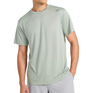 image:imageReebok Mens Small Logo Short Sleeve Crewneck TShirt Standard Fit Breathable Lightweight Stretch Knit FabricIceberg Green Heather  Dash