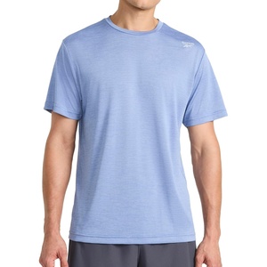 image:imageReebok Mens Small Logo Short Sleeve Crewneck TShirt Standard Fit Breathable Lightweight Stretch Knit FabricStonewash Heather  Dash