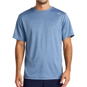image:imageReebok Mens Small Logo Short Sleeve Crewneck TShirt Standard Fit Breathable Lightweight Stretch Knit FabricVector Shadow Heather  Compass